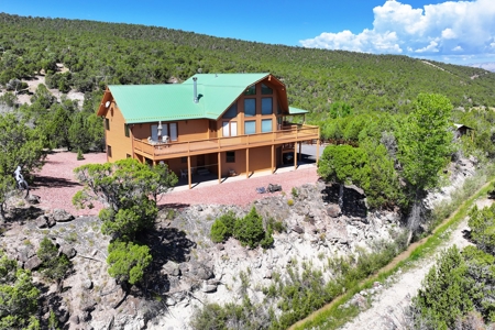 Mountain Home with Cabin on Acreage and Borders BLM For Sale - image 8