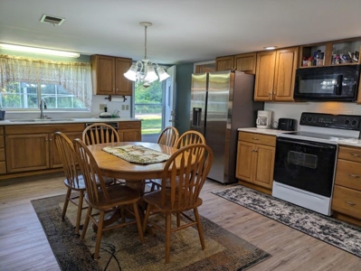 Country Home 1.67 acres with Pond for Sale Atlanta MI - image 24
