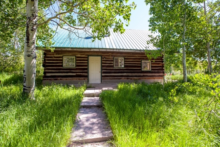 Hunting and Recreational Property on 76 Acres in CO with Cabin, Pond in Unit 12 - image 1