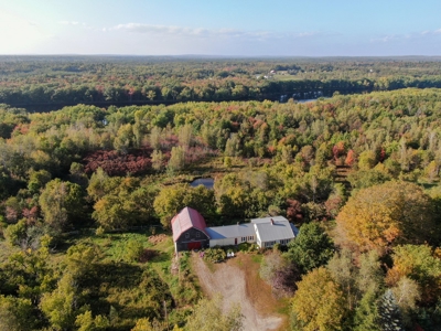 Charming New England Farmhouse with Acreage and Riverfront - image 1