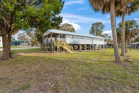 Waterfront Home For Sale In Suwannee Florida - image 1
