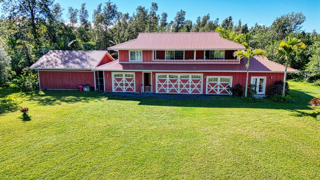 4 car garage with guest house above
