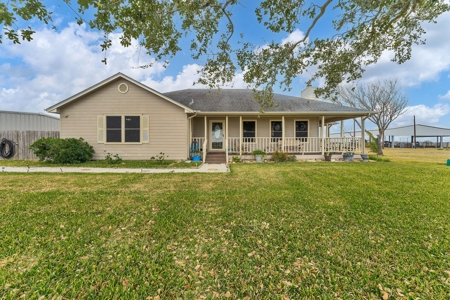 3/2 Home on 12.5acres with arena, barns, chicken coop. - image 1