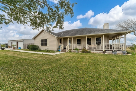 3/2 Home on 12.5acres with arena, barns, chicken coop. - image 10