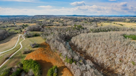 Escape to nature on this stunning 5.02-acre property! - image 10