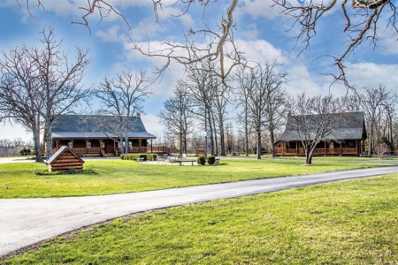 Beautiful Log Homes Situated on 250 Acres in Stockton, MO - image 1