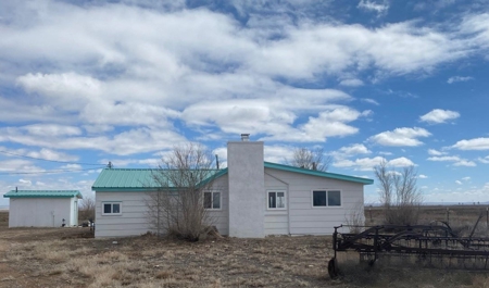 160-Acre Farming Haven with Farmhouse and Water Rights! - image 1