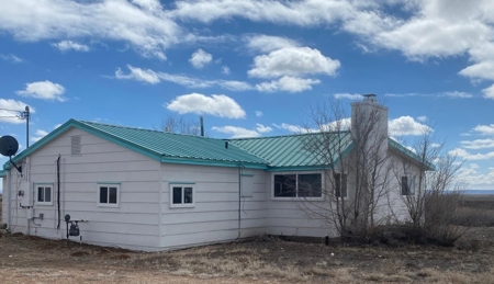 160-Acre Farming Haven with Farmhouse and Water Rights! - image 2