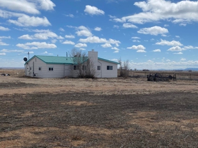 160-Acre Farming Haven with Farmhouse and Water Rights! - image 3