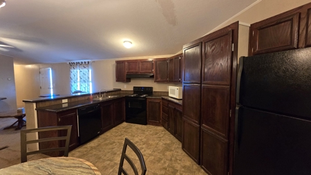 11.80 acres ± w/Multiple Residences Plus 50’x80 ‘Shed! - image 12