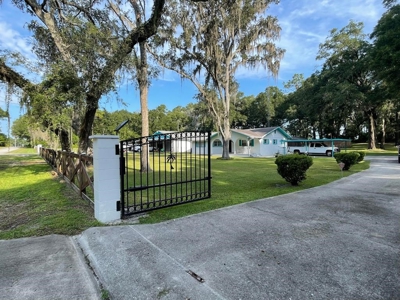 Home For Sale With Pool And Shop - Chiefland, Florida - image 2