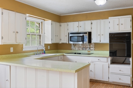 Unlock Potential in This Charming 1977 Fixer-Upper - image 16