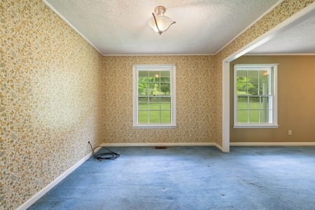 Unlock Potential in This Charming 1977 Fixer-Upper - image 8