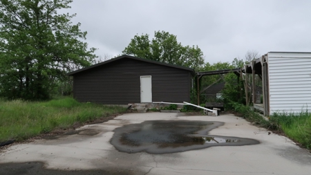 75 Acres m/l with Buildings/ Lake/ Income - image 19