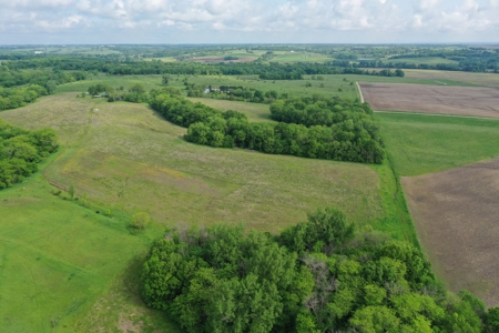75 Acres m/l with Buildings/ Lake/ Income - image 16