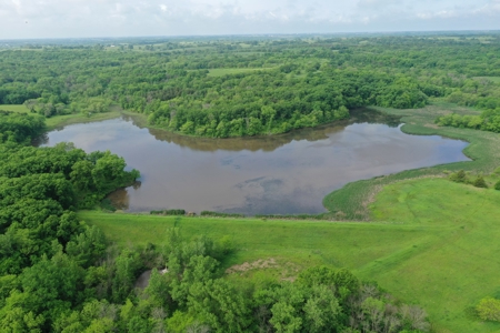 75 Acres m/l with Buildings/ Lake/ Income - image 13