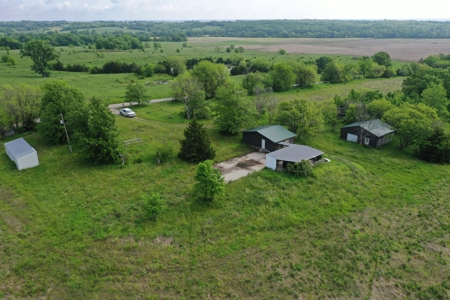 75 Acres m/l with Buildings/ Lake/ Income - image 9