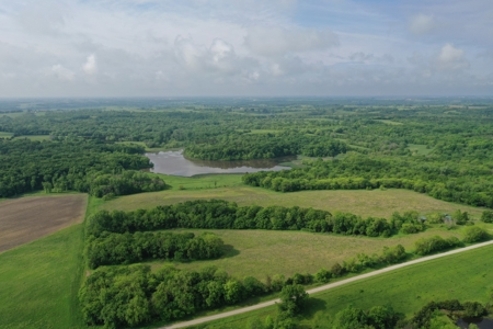 75 Acres m/l with Buildings/ Lake/ Income - image 1