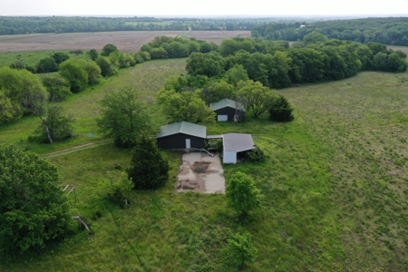 75 Acres m/l with Buildings/ Lake/ Income - image 10