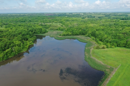 75 Acres m/l with Buildings/ Lake/ Income - image 15
