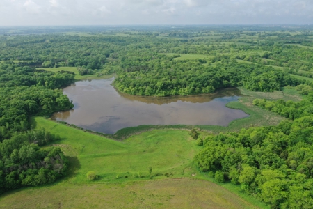 75 Acres m/l with Buildings/ Lake/ Income - image 3