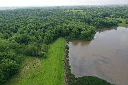 75 Acres m/l with Buildings/ Lake/ Income - image 12