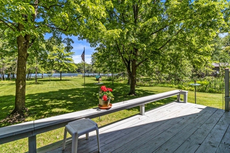 Quintessential Michigan lake cottage with acreage - image 29