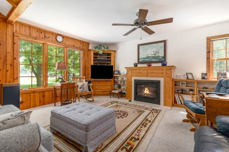 Quintessential Michigan lake cottage with acreage - image 24