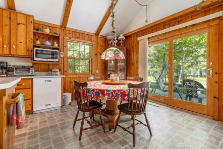 Quintessential Michigan lake cottage with acreage - image 22