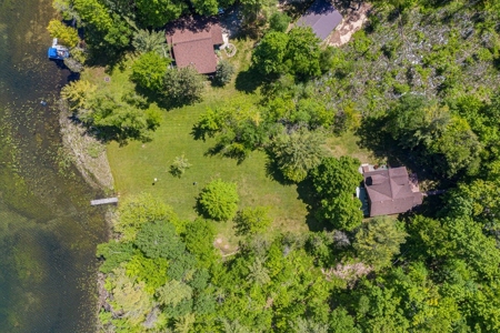 Quintessential Michigan lake cottage with acreage - image 34