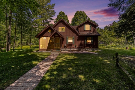 Quintessential Michigan lake cottage with acreage - image 35