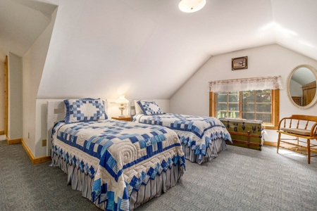 Quintessential Michigan lake cottage with acreage - image 12