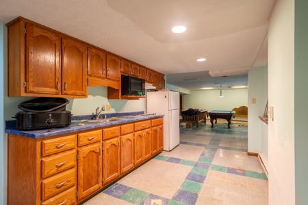 Country Home and Land for Sale in Vienna, MO - image 38