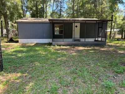 3/2 mobile home, on .18 acres. - image 1