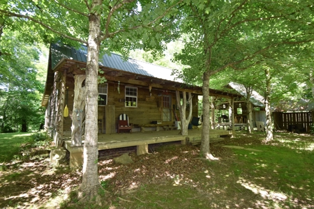 Off Grid Buffalo River Front Cabin & 18.66 Acres $345,900 - image 1