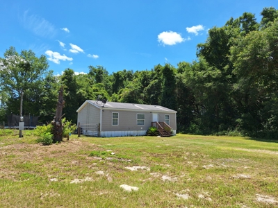 5 Acre Corner Lot At Carter's Crossroads With 3 Bedroom Home - image 2