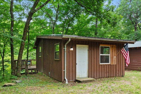 Two homes and three cabins on live year round creek in Shady - image 11