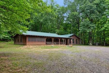 Two homes and three cabins on live year round creek in Shady - image 22