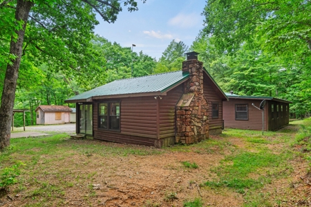 Two homes and three cabins on live year round creek in Shady - image 19