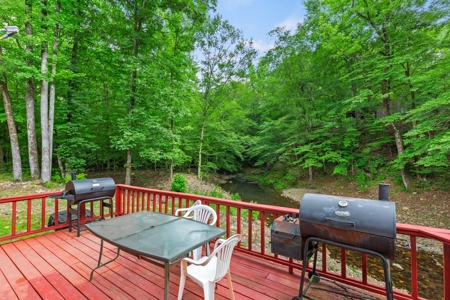 Two homes and three cabins on live year round creek in Shady - image 42