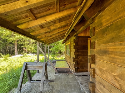 Dovetailed Log Cabins on Wilderness Cold Water Lake - image 14