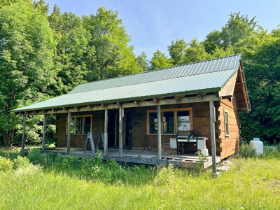 Dovetailed Log Cabins on Wilderness Cold Water Lake - image 6