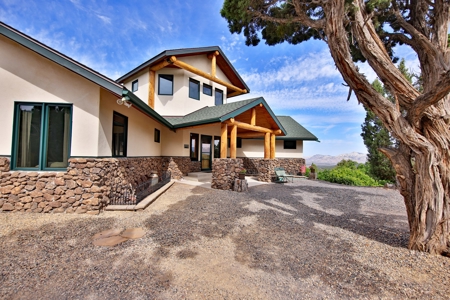 Mountain Home with Acreage and Views For Sale in Colorado - image 1