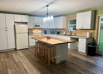 Very nice country home with partially wooded 20 acres. - image 9