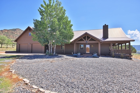Log Home with Acreage and Horse Corrals For Sale in Colorado - image 1