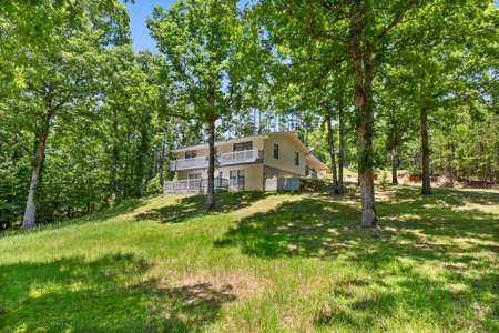 Home on 40 acres & live water in Heath Valley near ATV trail - image 1