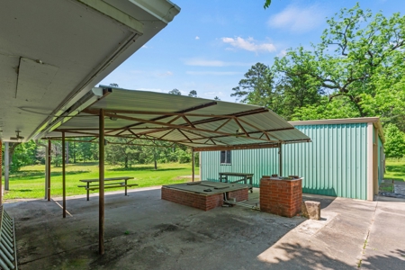 Home on stocked lake and fishing pier with 143 acres - image 25