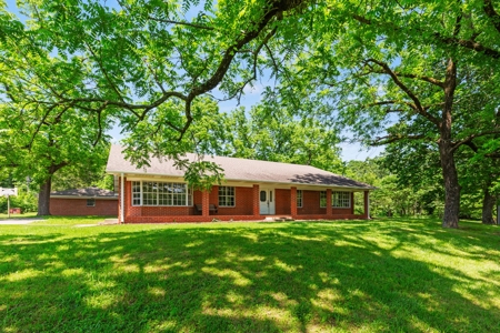 Home on stocked lake and fishing pier with 143 acres - image 20