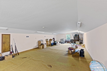 Home on stocked lake and fishing pier with 143 acres - image 18