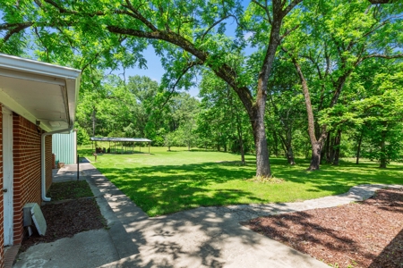 Home on stocked lake and fishing pier with 143 acres - image 22